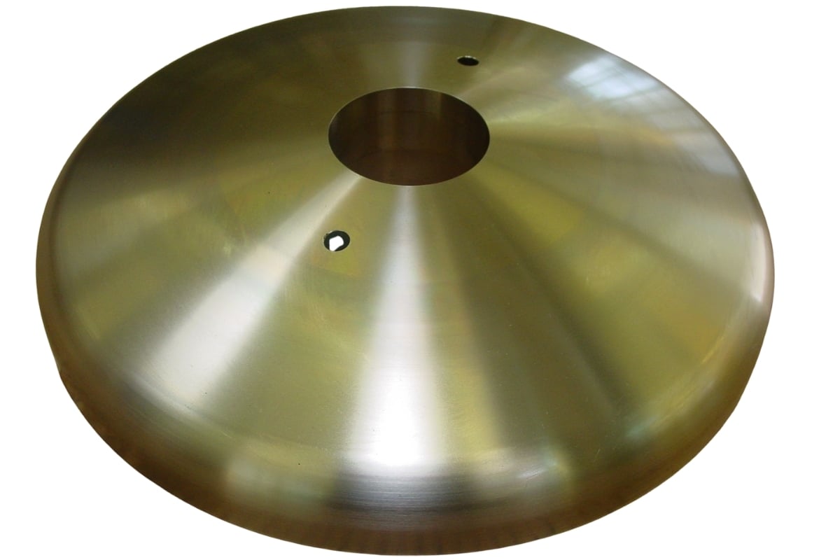 An aluminum bronze punch head for a cleaner surface finish