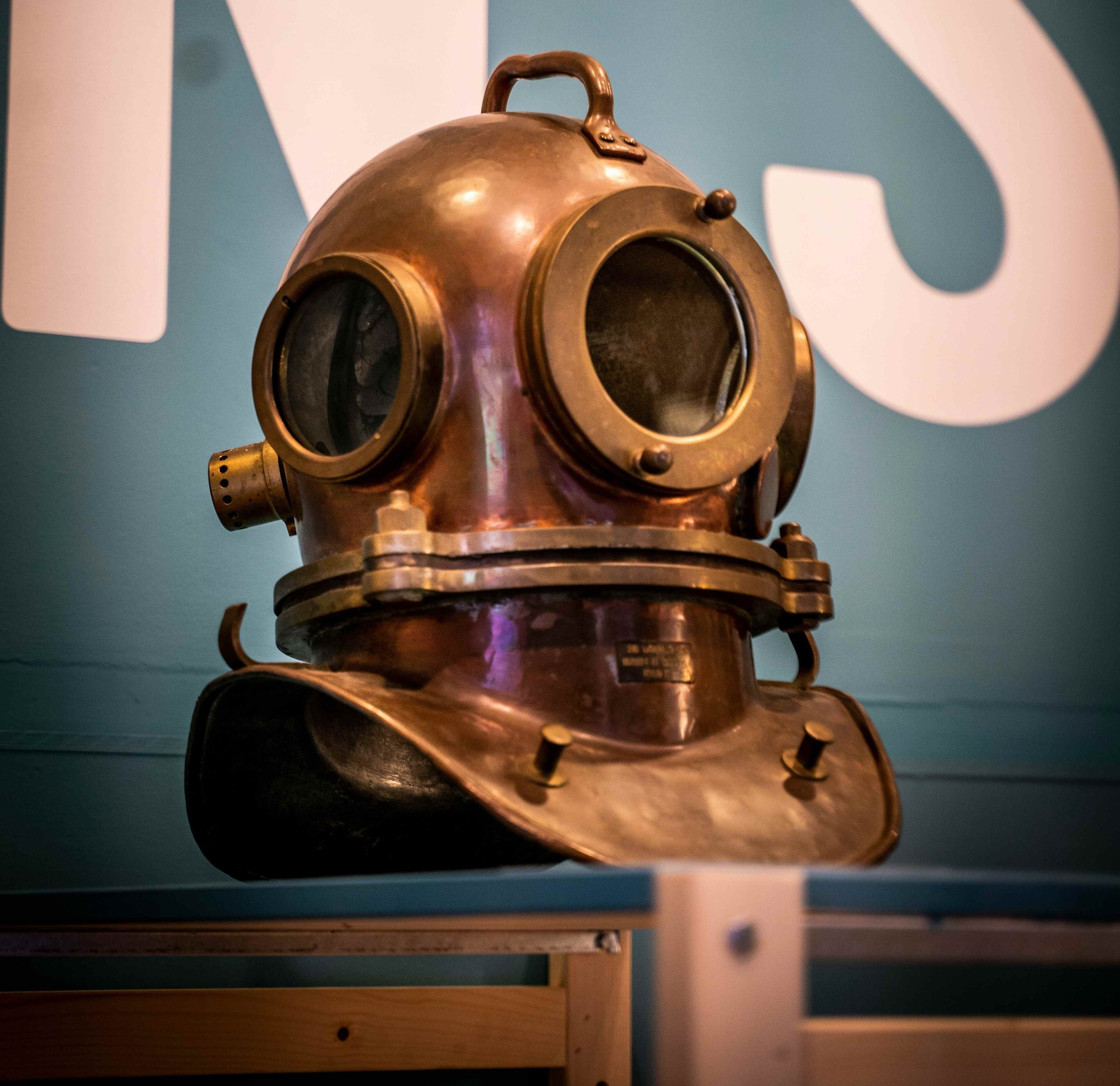 A diving helmet on display in a museum