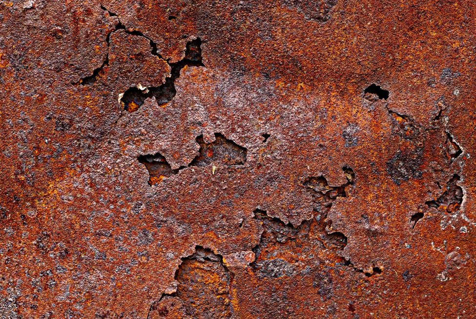 A metal surface deteriorated due to strong corrosion