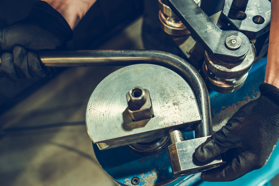 Tube bending process using only steel components